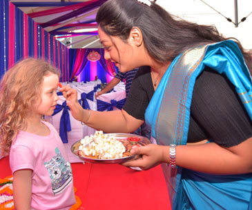 Photos of Garlanding Tikka to Guests